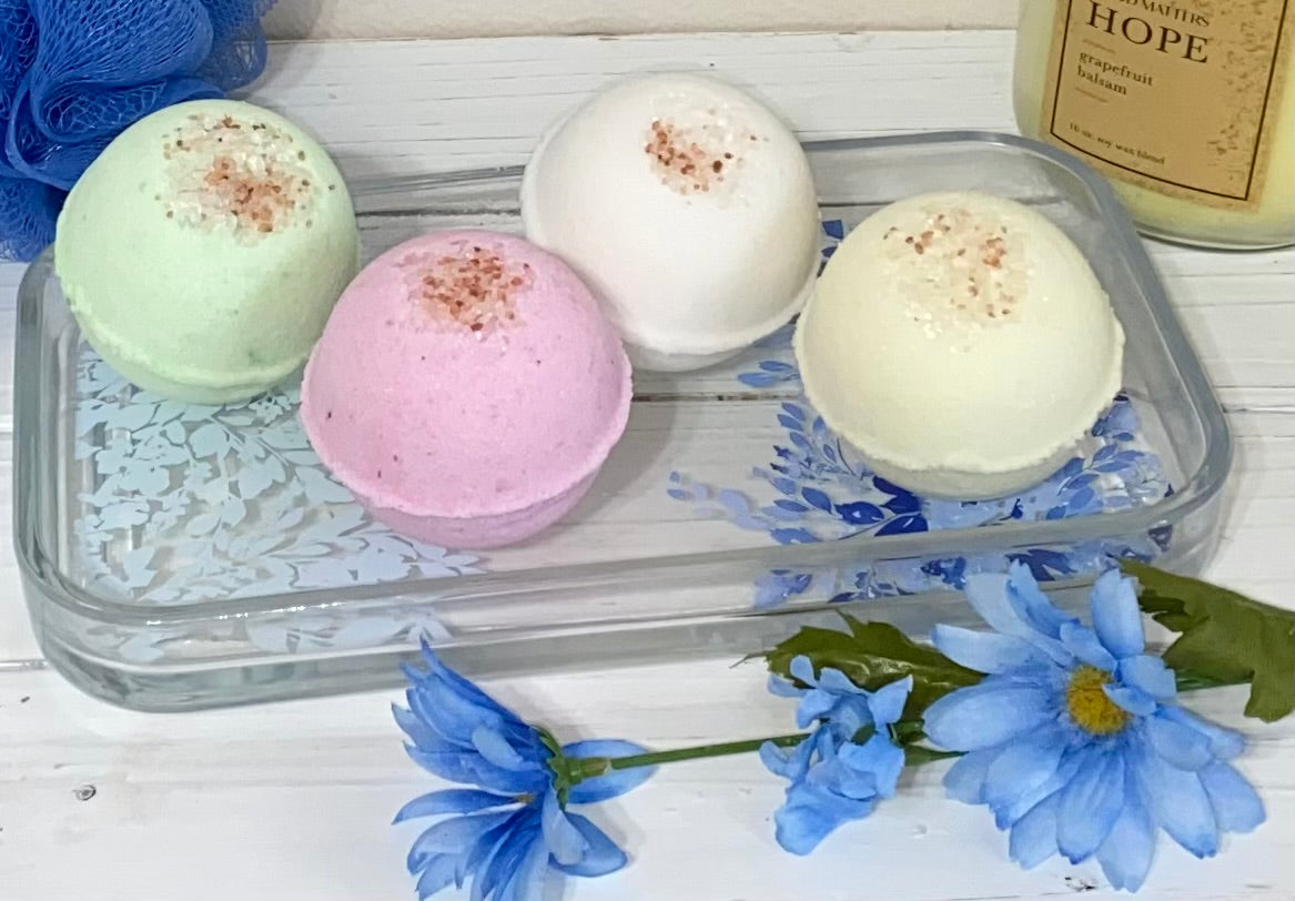 Discover a luxurious spa experience at home with our Moisturizing Bath Bomb Set! Our all-natural, vegan-friendly bath bombs are designed to help you relax, unwind, and moisturize your skin. The perfect way to melt away the day is an amazing self-care gift set for you or for your loved ones. Each bomb is filled with essential all-natural ingredients to soothe, moisturize, relieve stress, and reduce inflammation.