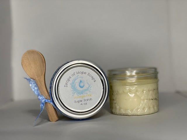 An essential part of skincare, this all-natural Sugar Scrub will exfoliate, detoxify, and cleanse your skin. The scrub also contains essential oils for a subtle, calming scent. Infused with lemon and champagne extract, this super scrub will leave your whole body feeling fresh, rejuvenated, silky-smooth, and moisturized.  A self-care MUST!