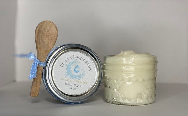 An essential part of skincare, this all-natural Sugar Scrub will exfoliate, detoxify, and cleanse your skin. The scrub also contains essential oils for a subtle, calming scent. Infused with lemon and champagne extract, this super scrub will leave your whole body feeling fresh, rejuvenated, silky-smooth, and moisturized.  A self-care MUST!
