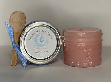 An essential part of skincare, this all-natural Sugar Scrub will exfoliate, detoxify, and cleanse your skin. The scrub also contains essential oils for a subtle, calming scent. Infused with lemon and champagne extract, this super scrub will leave your whole body feeling fresh, rejuvenated, silky-smooth, and moisturized.  A self-care MUST!