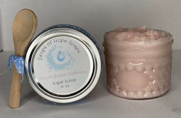 An essential part of skincare, this all-natural Sugar Scrub will exfoliate, detoxify, and cleanse your skin. The scrub also contains essential oils for a subtle, calming scent. Infused with lemon and champagne extract, this super scrub will leave your whole body feeling fresh, rejuvenated, silky-smooth, and moisturized.  A self-care MUST!