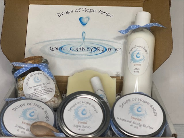 All-Natural Deluxe Skin Care Set. Set includes bath salts, lip balm, lotion, lotion bar, body butter, and sugar scrub. All-Natural organic ingredients.