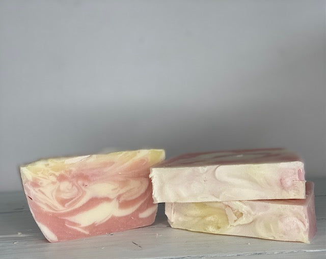 Luxurious lather packed with essential vitamins to keep the skin healthy, firm and moisturized. Handmade with all-natural organic ingredients, this soap is an essential part of any skincare routine. Gentle enough to use on both body and face. Sweetly scented with pure fragrance oils. Enjoy clean, soft, and healthy skin with our Moisturizing Shea Butter Soap!