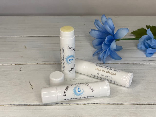 Give your lips the nourishment they need with our ultra-hydrating Moisturizing Lip Balm. Formulated with natural oils and waxes, this lip balm locks in moisture to keep lips soft, supple, and silky. Our lightweight formula is non-greasy and won't leave a waxy or sticky residue. Plus, it has a pleasant, natural scent that won't overwhelm your senses.