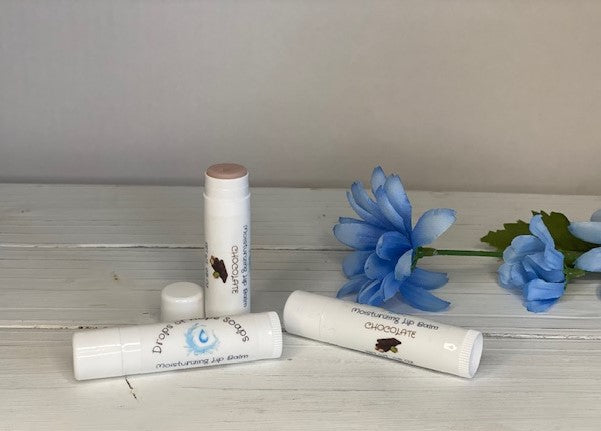 Give your lips the nourishment they need with our ultra-hydrating Moisturizing Lip Balm. Formulated with natural oils and waxes, this lip balm locks in moisture to keep lips soft, supple, and silky. Our lightweight formula is non-greasy and won't leave a waxy or sticky residue. Plus, it has a pleasant, natural scent that won't overwhelm your senses.