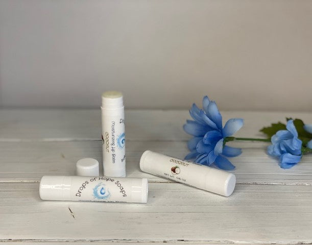 Give your lips the nourishment they need with our ultra-hydrating Moisturizing Lip Balm. Formulated with natural oils and waxes, this lip balm locks in moisture to keep lips soft, supple, and silky. Our lightweight formula is non-greasy and won't leave a waxy or sticky residue. Plus, it has a pleasant, natural scent that won't overwhelm your senses.