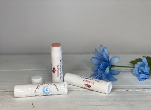 Give your lips the nourishment they need with our ultra-hydrating Moisturizing Lip Balm. Formulated with natural oils and waxes, this lip balm locks in moisture to keep lips soft, supple, and silky. Our lightweight formula is non-greasy and won't leave a waxy or sticky residue. Plus, it has a pleasant, natural scent that won't overwhelm your senses.